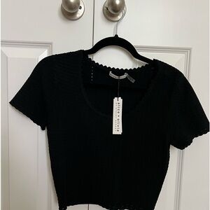 Never wear Alice + Olivia brand NWT top in black color.